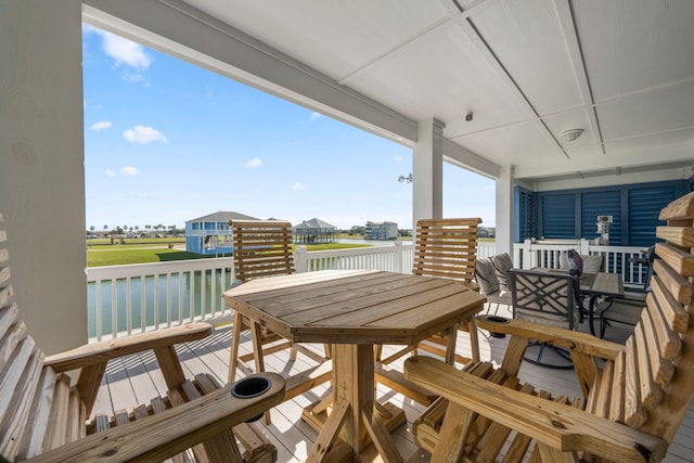 1816 Laguna Harbor Estate Blvd, Port Bolivar, TX 77650 - balcony with a water view and outdoor dining area