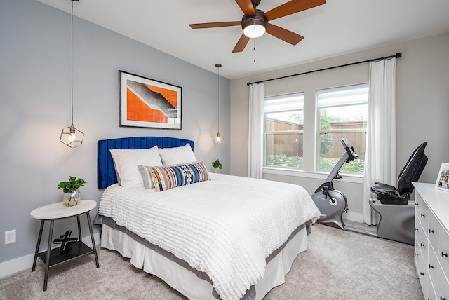 10914 Brambling Wood Dr S, Houston, TX 77043 - bedroom with light colored carpet, baseboards, and ceiling fan
