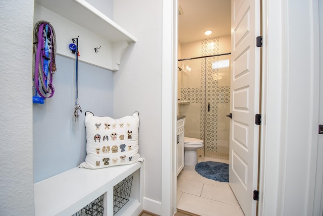 10914 Brambling Wood Dr S, Houston, TX 77043 - mudroom with light tile patterned floors