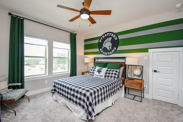 10914 Brambling Wood Dr S, Houston, TX 77043 - bedroom with carpet floors, baseboards, and a ceiling fan