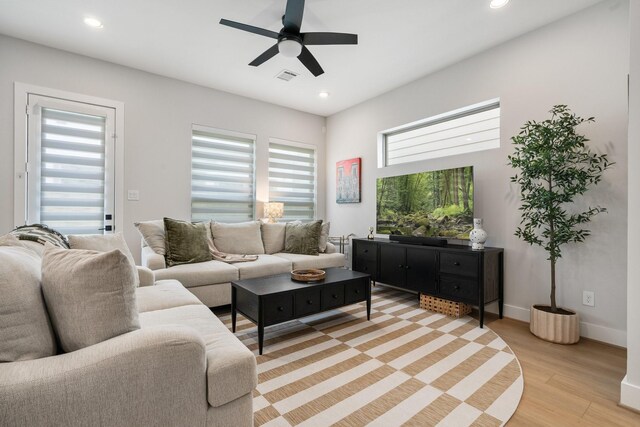 2200 Marnel Rd Unit F, Houston, TX 77055 - living area featuring ceiling fan, light wood-type flooring, recessed lighting, and baseboards