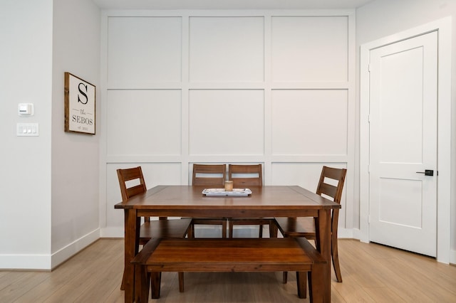 2200 Marnel Rd Unit F, Houston, TX 77055 - dining room with light wood-style floors and baseboards