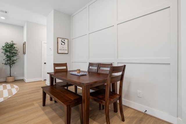 2200 Marnel Rd Unit F, Houston, TX 77055 - dining area featuring light wood-style floors, baseboards, and recessed lighting
