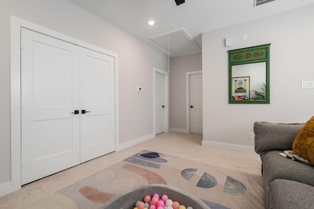 2200 Marnel Rd Unit F, Houston, TX 77055 - carpeted living room featuring attic access, baseboards, and recessed lighting