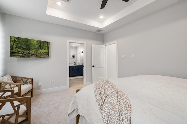 2200 Marnel Rd Unit F, Houston, TX 77055 - bedroom featuring light colored carpet, recessed lighting, baseboards, ensuite bathroom, and a sink