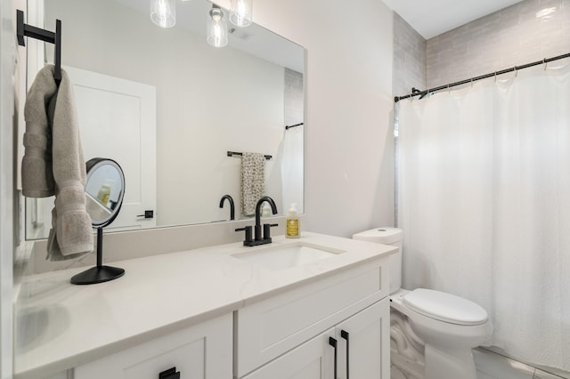 2200 Marnel Rd Unit F, Houston, TX 77055 - bathroom featuring toilet, vanity, and a shower with shower curtain