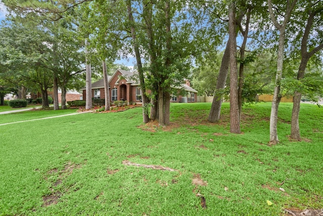 6927 Queensclub Dr, Houston, TX 77069 - view of front of property with a front yard
