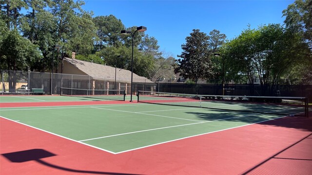 6927 Queensclub Dr, Houston, TX 77069 - view of tennis court featuring community basketball court