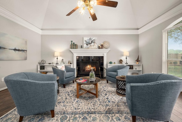 6927 Queensclub Dr, Houston, TX 77069 - living room with vaulted ceiling, a ceiling fan, wood finished floors, a fireplace, and crown molding