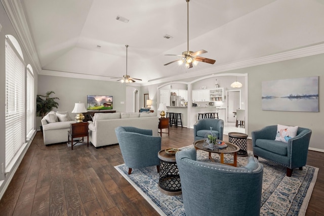 6927 Queensclub Dr, Houston, TX 77069 - living room featuring ceiling fan, dark wood finished floors, lofted ceiling, and crown molding