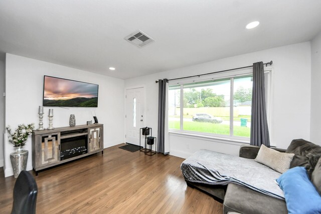 119 Burke Rd, Pasadena, TX 77506 - bedroom featuring wood finished floors, recessed lighting, and baseboards
