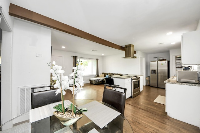 119 Burke Rd, Pasadena, TX 77506 - dining area featuring dark wood-type flooring and recessed lighting