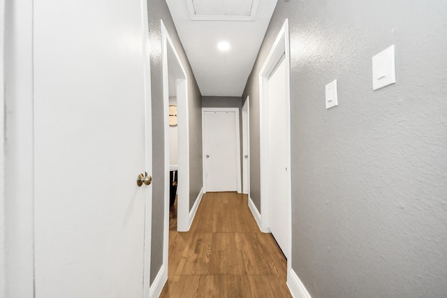 119 Burke Rd, Pasadena, TX 77506 - corridor with wood finished floors and baseboards