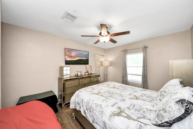 119 Burke Rd, Pasadena, TX 77506 - bedroom featuring dark wood-type flooring and ceiling fan