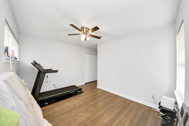119 Burke Rd, Pasadena, TX 77506 - workout room with wood finished floors, ceiling fan, plenty of natural light, and baseboards