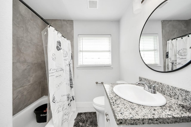 119 Burke Rd, Pasadena, TX 77506 - bathroom with vanity, toilet, shower / bath combo with shower curtain, baseboards, and tile patterned flooring