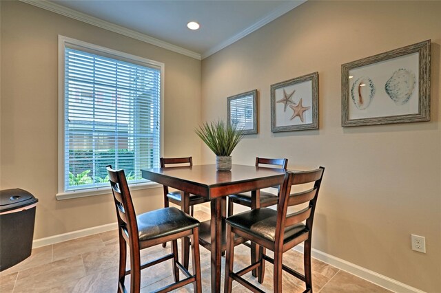 7000 Seawall Blvd Unit 914, Galveston, TX 77551 - dining space featuring ornamental molding, baseboards, and recessed lighting