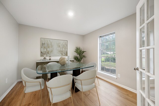 1802 Corral Dr, Houston, TX 77090 - dining space featuring wood finished floors and baseboards