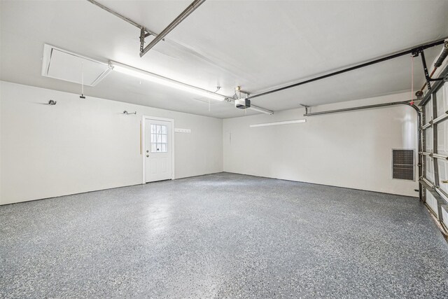 1802 Corral Dr, Houston, TX 77090 - garage featuring a garage door opener