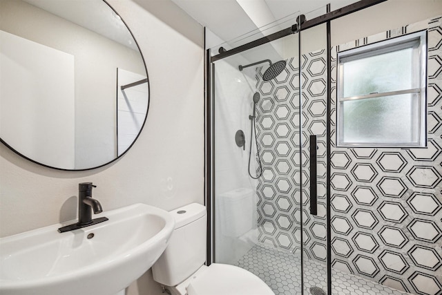 1802 Corral Dr, Houston, TX 77090 - bathroom with a sink, toilet, and a shower stall