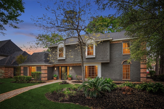 1802 Corral Dr, Houston, TX 77090 - view of front of home with a front yard and brick siding