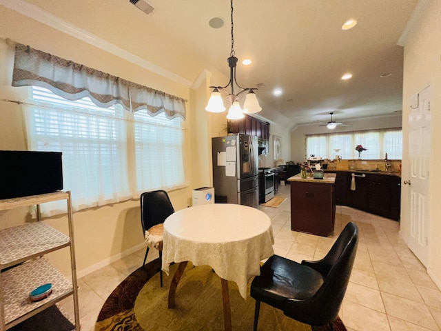 21607 Goloby Dr, Richmond, TX 77407 - dining area with ornamental molding, light tile patterned floors, recessed lighting, a ceiling fan, and lofted ceiling