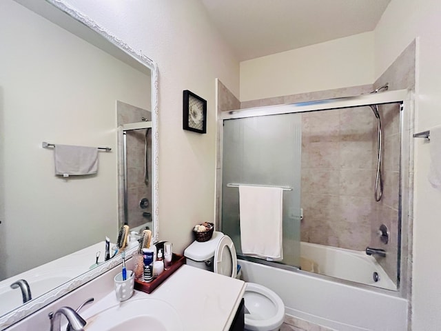 21607 Goloby Dr, Richmond, TX 77407 - full bathroom with vanity, toilet, and bath / shower combo with glass door