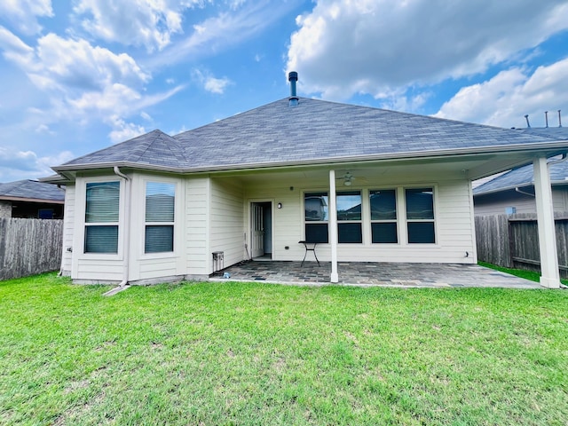 21607 Goloby Dr, Richmond, TX 77407 - rear view of house with a patio area