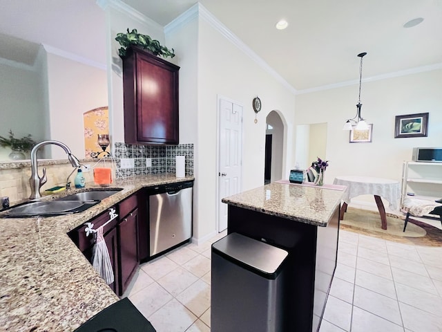 21607 Goloby Dr, Richmond, TX 77407 - kitchen with dishwasher, a sink, light tile patterned floors, a center island, and decorative backsplash