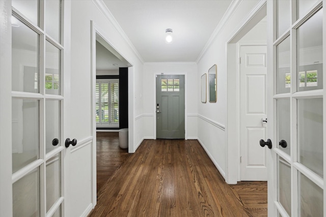 10043 Overbrook Ln, Houston, TX 77042 - foyer with ornamental molding and dark wood finished floors