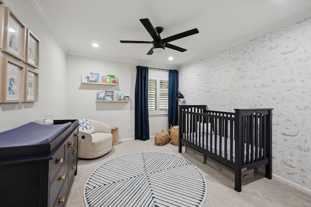 10043 Overbrook Ln, Houston, TX 77042 - carpeted bedroom with ornamental molding, a crib, baseboards, recessed lighting, and a ceiling fan