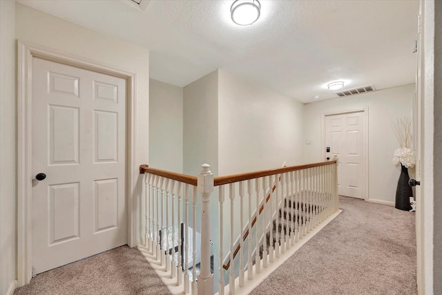 3602 Garrettsville Dr, Pearland, TX 77584 - corridor featuring carpet floors, an upstairs landing, and baseboards