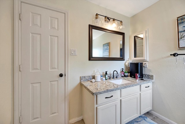 3602 Garrettsville Dr, Pearland, TX 77584 - bathroom featuring vanity and baseboards