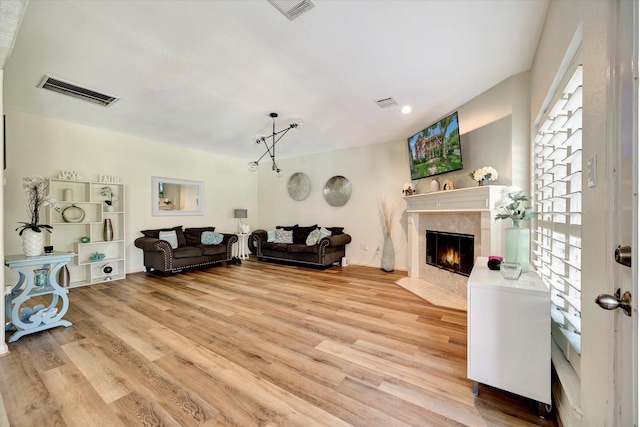 3602 Garrettsville Dr, Pearland, TX 77584 - living room with light wood-style flooring, a fireplace, and recessed lighting