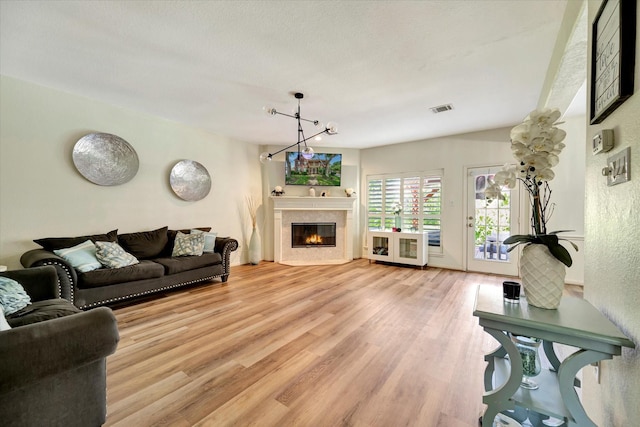 3602 Garrettsville Dr, Pearland, TX 77584 - living area with wood finished floors and a high end fireplace