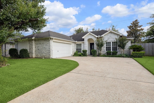 2818 Cocona Ln, Houston, TX 77073 - ranch-style home featuring driveway, an attached garage, brick siding, and roof with shingles