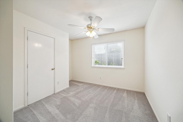 2818 Cocona Ln, Houston, TX 77073 - carpeted spare room featuring a ceiling fan and baseboards