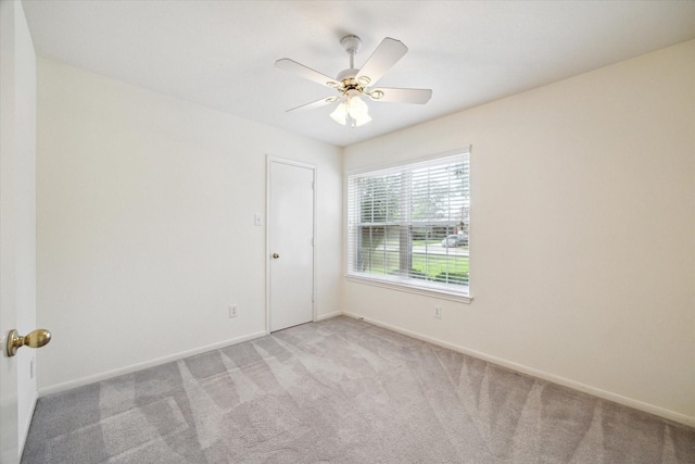 2818 Cocona Ln, Houston, TX 77073 - unfurnished room with light carpet, baseboards, and ceiling fan