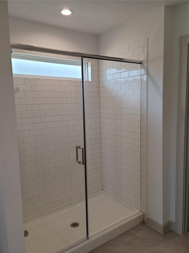 703 Alpine Falls Rd, Rosharon, TX 77583 - bathroom with a shower stall, tile patterned floors, and recessed lighting