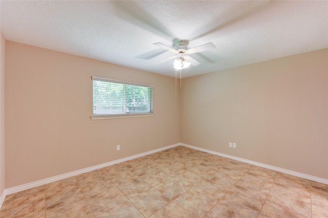 4430 Peridot Ln, Friendswood, TX 77546 - empty room featuring a ceiling fan and baseboards