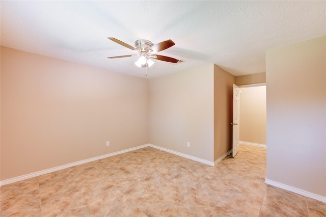 4430 Peridot Ln, Friendswood, TX 77546 - spare room with a ceiling fan and baseboards