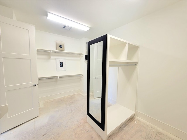 2806 Rosefield Dr, Houston, TX 77080 - bathroom with baseboards, electric panel, and concrete flooring