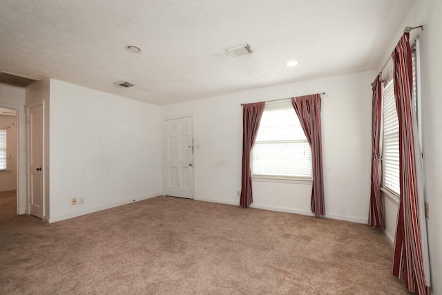 6514 Westview Dr, Houston, TX 77055 - unfurnished room with carpet flooring, healthy amount of natural light, and recessed lighting