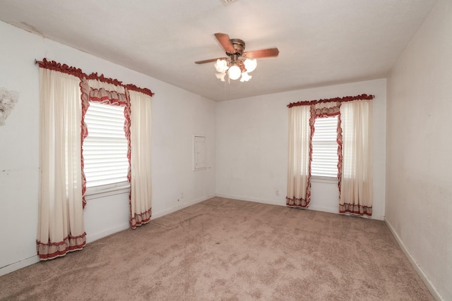 6514 Westview Dr, Houston, TX 77055 - carpeted empty room featuring plenty of natural light, ceiling fan, and baseboards