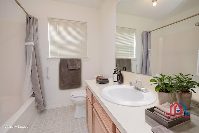 3 Lazybrook St, Angleton, TX 77515 - bathroom with vanity, shower / tub combo with curtain, baseboards, and toilet