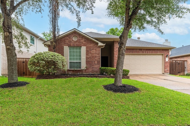 21127 Gladys Yoakum Dr, Richmond, TX 77406 - ranch-style house with brick siding, an attached garage, driveway, and a shingled roof