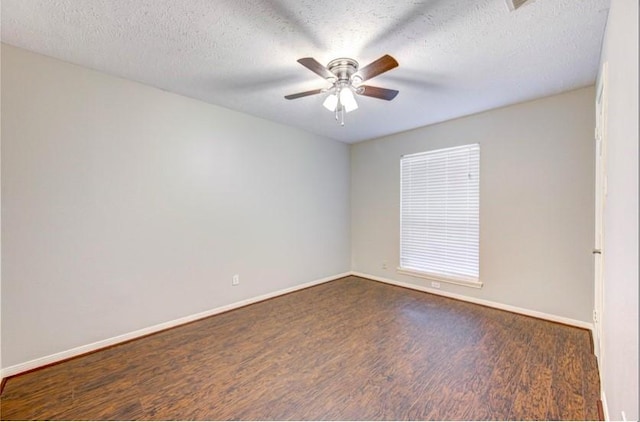 3838 Fawn Creek Dr, Houston, TX 77339 - spare room with wood finished floors, a ceiling fan, baseboards, and a textured ceiling