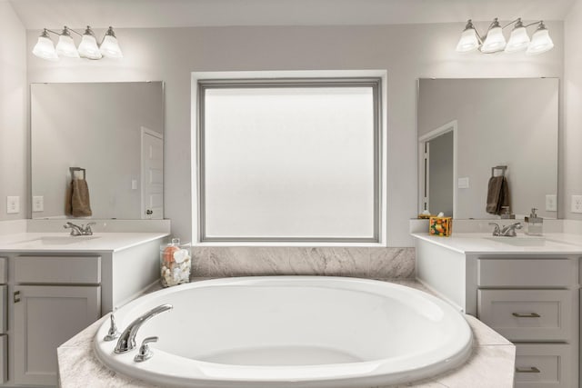 27114 Sofia Forest Dr, Magnolia, TX 77354 - full bath with two vanities and a garden tub