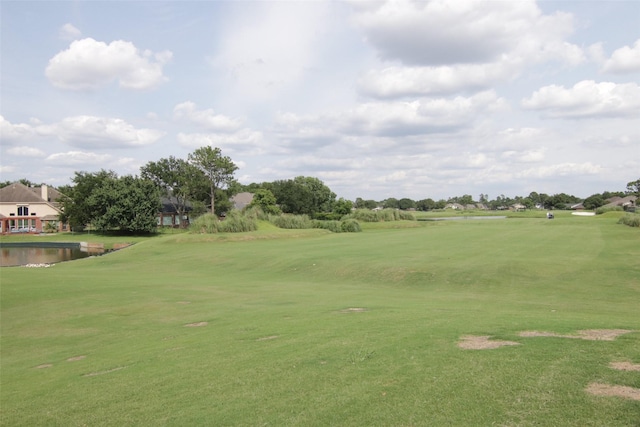 2107 Blue Water Bay Dr, Katy, TX 77494 - surrounding community with view of golf course, a water view, and a yard