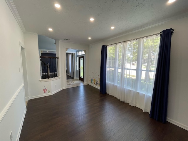 7802 Strathclyde Sound Rd, Houston, TX 77095 - unfurnished living room featuring recessed lighting, ornamental molding, dark wood-style floors, stairway, and a textured ceiling